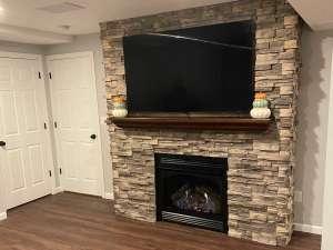 The Basic Basement Co. - Finished Basement with a Half Bathroom and Custom Fireplace - Barnegat, New Jersey - November 2022