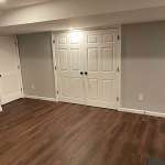 The Basic Basement Co. - Finished Basement with a Half Bathroom and Custom Fireplace - Barnegat, New Jersey - November 2022