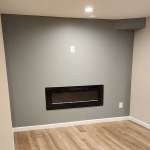 The Basic Basement Co. - Finished Basement with Coretec ProPlus Wheldon Oak flooring and electric fireplace installations - Bridgewater, New Jersey - May 2023